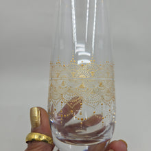 Load image into Gallery viewer, Hand Painted crystal champagne glasses - intricate henna inspired art in Gold.