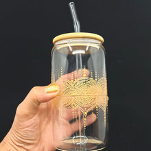 Load image into Gallery viewer, Hand painted glass tumbler with lid and straw- intricate henna inspired art in Gold.