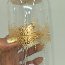 Load image into Gallery viewer, Hand painted glass tumbler with lid and straw- intricate henna inspired art in Gold.