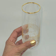 Load image into Gallery viewer, Hand Painted crystal champagne glasses - intricate henna inspired art in Gold.