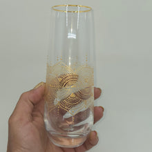 Load image into Gallery viewer, Hand Painted crystal champagne glasses - intricate henna inspired art in Gold.