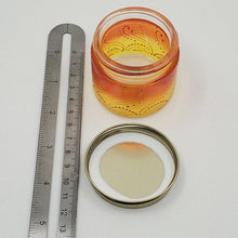 Load image into Gallery viewer, Hand Stained-Painted glass jar - orange fading to yellow (ombre) with intricate gold (henna style) designs.