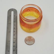 Load image into Gallery viewer, Hand Stained-Painted glass jar - orange fading to yellow (ombre) with intricate gold (henna style) designs.