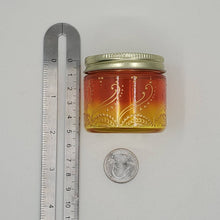 Load image into Gallery viewer, Hand Stained-Painted glass jar - orange fading to yellow (ombre) with intricate gold (henna style) designs.