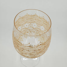 Load image into Gallery viewer, Hand Painted Wine Glass with intricate Gold Bohemian Henna Designs. Elegant and stunning
