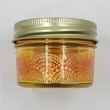Load image into Gallery viewer, Hand Stained - Hand Painted wide mouth glass jar - yellow fading to orange (ombre) with intricate gold (henna style) designs. Boho