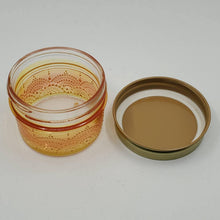Load image into Gallery viewer, Hand Stained - Hand Painted wide mouth glass jar - yellow fading to orange (ombre) with intricate gold (henna style) designs. Boho