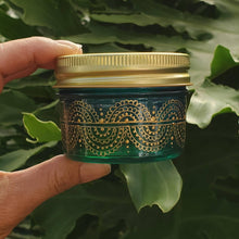 Load image into Gallery viewer, Hand Stained - Hand Painted wide mouth glass jar - blue fading to green (ombre) with intricate gold (henna style) designs. Boho