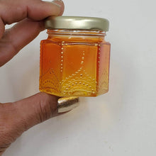 Load image into Gallery viewer, Hand Stained-Painted glass jar- orange fading to yellow with intricate gold henna style designs in gold