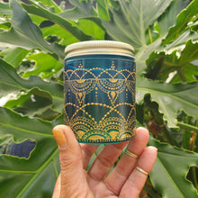 Load image into Gallery viewer, Hand Stained - Hand Painted glass jar - green fading to blue (hombre) with intricate gold (henna style) designs.