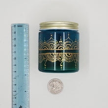 Load image into Gallery viewer, Hand Stained-Painted glass jar- green fading to blue (ombre) with intricate gold (henna style) designs. Bohemian centerpiece