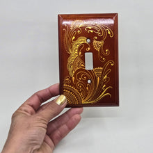 Load image into Gallery viewer, Hand Painted wood Switch plate /cover plate for Toggle switch - Oversized. Gold henna inspired designs on Cherry stained wood