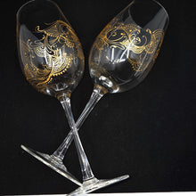 Load image into Gallery viewer, Hand Painted Crystal wine glass. Intricate gold henna inspired art winding around the entire glass.