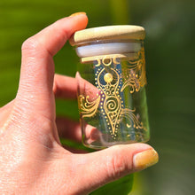 Load image into Gallery viewer, Stash Jar. Hand painted glass jar with sacred Goddess and moon cycles painted in gold. Airtight, straight sided, portable herb jar

