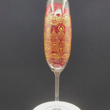 Load and play video in Gallery viewer, Hand Painted Sacred Goddess Chalice Champagne Glass . Goddess figure with moon cycles and intricate gold (henna style) designs
