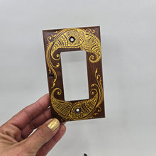 Load image into Gallery viewer, Hand Painted Walnut wood Switch / Cover / Wall plate for Paddle switch or decora outlet -Midsized. Gold henna inspired designs on solid wood
