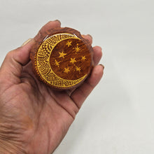 Load image into Gallery viewer, Medium size 4 part Herb Grinder with Kief catcher. Hand painted Moon on imitation wood. Sharp teeth, magnetic closure with smooth grinding
