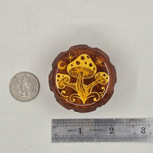 Load image into Gallery viewer, Small 4 part Herb Grinder with Kief catcher. Hand painted gold mushrooms on imitation wood. Sharp teeth, magnetic closure with smooth grinding
