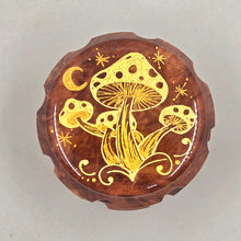 Load image into Gallery viewer, Medium size 4 part Herb Grinder with Kief catcher. Hand painted mushrooms on imitation wood. Sharp teeth, magnetic closure with smooth grinding
