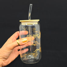 Load image into Gallery viewer, Hand painted glass tumbler with lid and straw- intricate henna inspired art in Gold.

