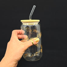 Load image into Gallery viewer, Hand painted glass tumbler with lid and straw- intricate henna inspired art in Gold.

