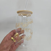 Load image into Gallery viewer, Hand painted glass tumbler with lid and straw- intricate henna inspired art in Gold.

