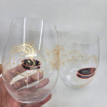 Load image into Gallery viewer, Hand Painted Riedel crystal wine glasses - intricate henna inspired art in Gold.
