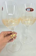 Load image into Gallery viewer, Hand Painted Riedel crystal wine glasses - intricate henna inspired art in Gold.
