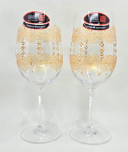 Load image into Gallery viewer, Hand Painted Riedel crystal wine glasses - intricate henna inspired art in Gold.
