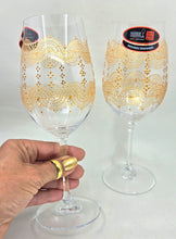Load image into Gallery viewer, Hand Painted Riedel crystal wine glasses - intricate henna inspired art in Gold.
