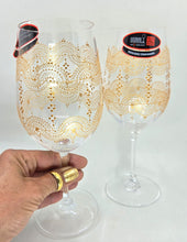 Load image into Gallery viewer, Hand Painted Riedel crystal wine glasses - intricate henna inspired art in Gold.
