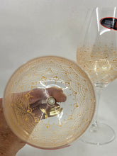 Load image into Gallery viewer, Hand Painted Riedel crystal wine glasses - intricate henna inspired art in Gold.
