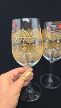 Load image into Gallery viewer, Hand Painted Riedel crystal wine glasses - intricate henna inspired art in Gold.
