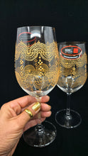 Load image into Gallery viewer, Hand Painted Riedel crystal wine glasses - intricate henna inspired art in Gold.
