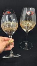 Load image into Gallery viewer, Hand Painted Riedel crystal wine glasses - intricate henna inspired art in Gold.
