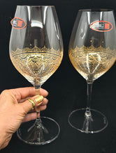 Load image into Gallery viewer, Hand Painted Riedel crystal wine glasses - intricate henna inspired art in Gold.
