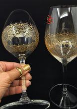 Load image into Gallery viewer, Hand Painted Riedel crystal wine glasses - intricate henna inspired art in Gold.
