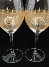 Load image into Gallery viewer, Hand Painted Riedel crystal wine glasses - intricate henna inspired art in Gold.
