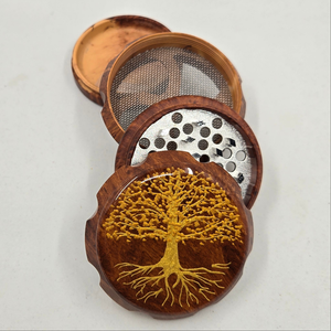 Medium size 4 part Herb Grinder with pollen catcher. Hand painted tree of life on imitation wood. Sharp teeth, magnetic closure with smooth grinding