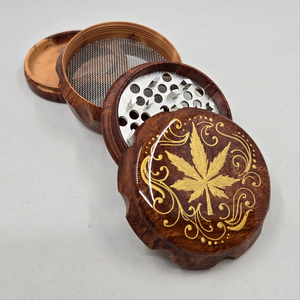 Medium size 4 part Herb Grinder with pollen catcher. Hand painted herb leaf