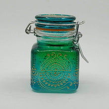 Load image into Gallery viewer, Hand Stained-Painted glass jar - blue fading to green (ombre) with intricate gold (henna style) designs.
