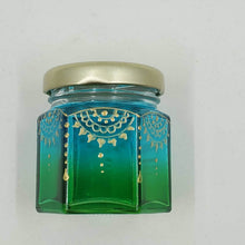 Load image into Gallery viewer, Hand Stained-Painted glass jar- green fading to blue with intricate gold henna style designs in gold
