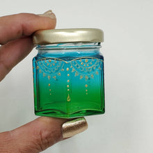 Load image into Gallery viewer, Hand Stained-Painted glass jar- green fading to blue with intricate gold henna style designs in gold
