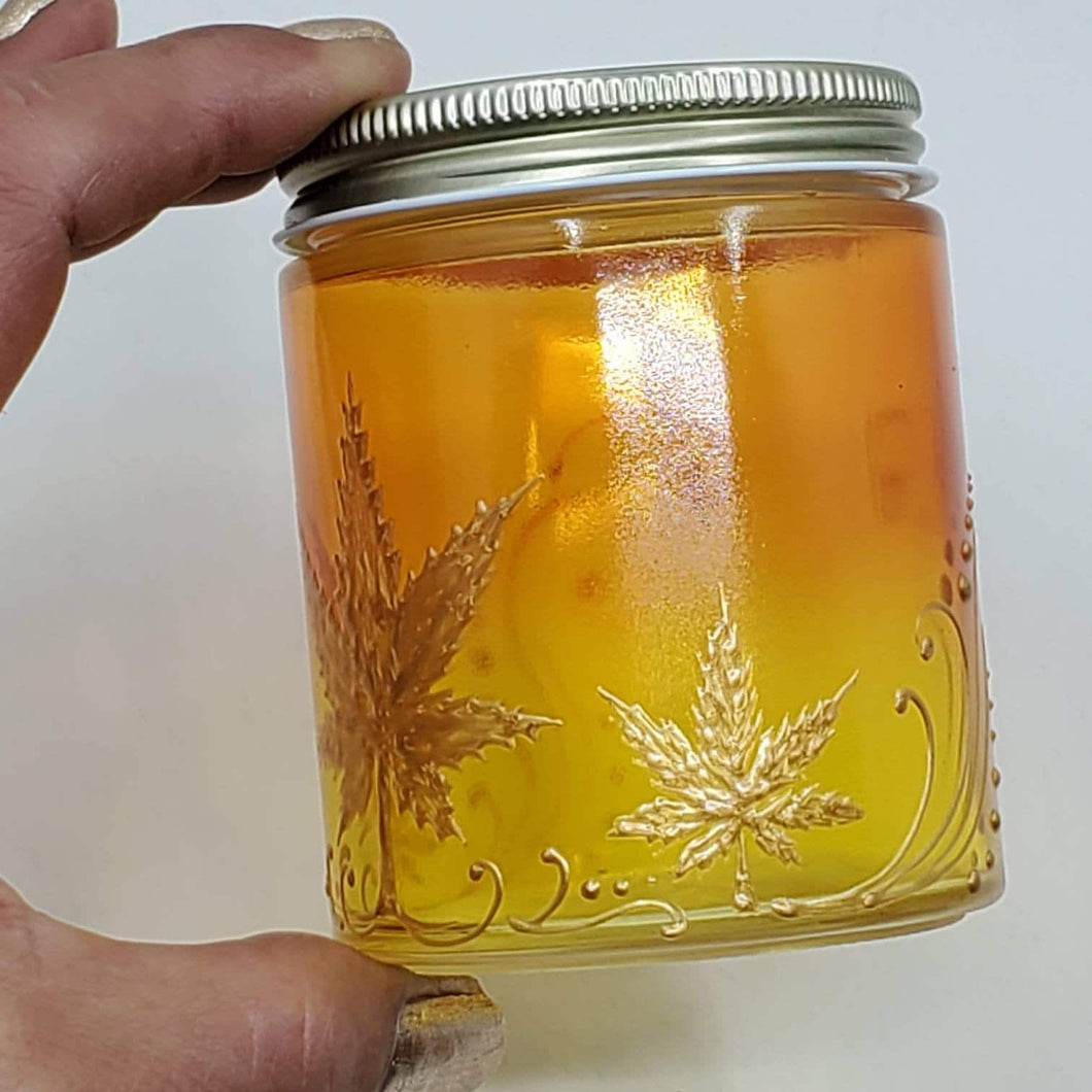 Hand Stained - Hand Painted glass nug jar - orange fading to yellow (Ombre) with gold marijuana leaves and swirls . Boho