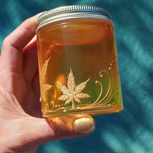 Hand Stained - Hand Painted glass nug jar - orange fading to yellow (Ombre) with gold marijuana leaves and swirls . Boho