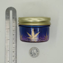 Load image into Gallery viewer, Hand Stained - Hand Painted glass nug jar - Wide Mouth! Purple fading to blue (Ombre) with gold marijuana leaves and swirls . Boho
