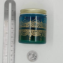 Load image into Gallery viewer, Hand Stained-Painted glass jar- green fading to blue(hombre) with intricate gold (henna style) designs.
