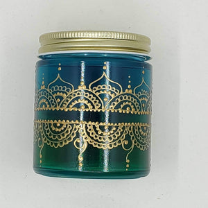 Hand Stained-Painted glass jar- green fading to blue(hombre) with intricate gold (henna style) designs.