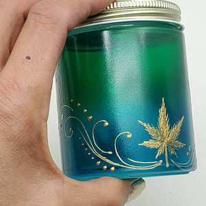 Hand Stained - Hand Painted glass nug jar - blue fading to green (Ombre) with gold marijuana leaves and swirls . Boho