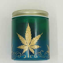 Load image into Gallery viewer, Hand Stained - Hand Painted glass nug jar - blue fading to green (Ombre) with gold marijuana leaves and swirls . Boho
